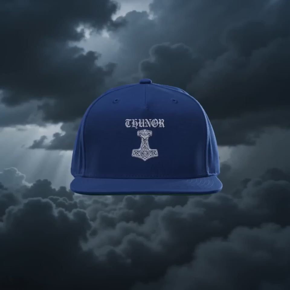 Donar's Club Flat Bill Cap against a stormy lightning sky — Thunor's Hammer Anglo-Saxon heritage snapback by The Shield Wall